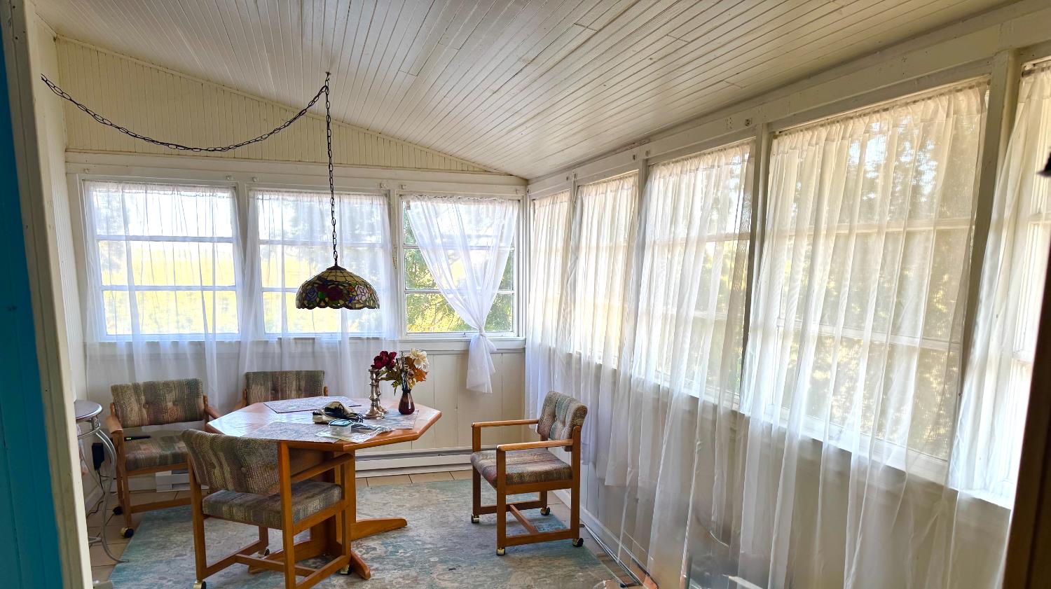 13911 River Road Walnut Grove, CA 95690 - Photo 3 of 9 a workspace with furniture and a window