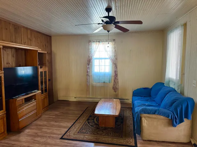 a bedroom with a bed and a closet