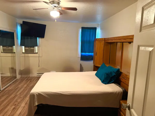 a view of a kitchen from the hallway
