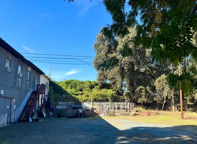 a view of a swimming pool with a patio