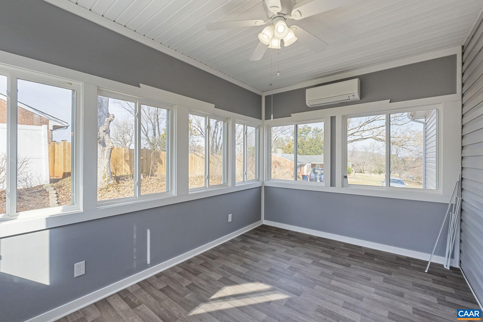 133 Red Hill Road Orange, VA 22960 - Photo 18 of 38 a view of an empty room with a window and wooden floor