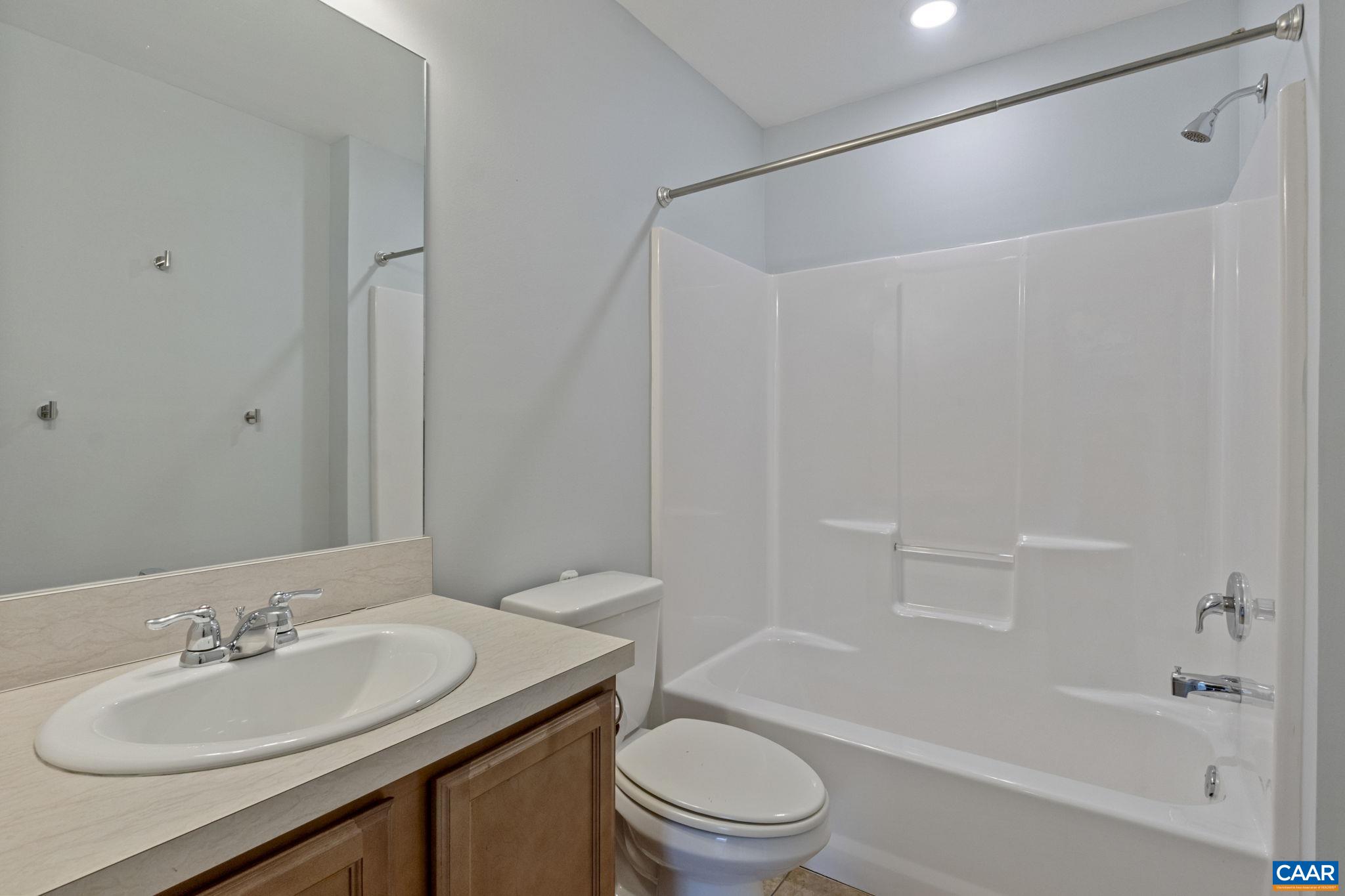 133 Red Hill Road Orange, VA 22960 - Photo 36 of 38 a bathroom with a granite countertop sink toilet and shower