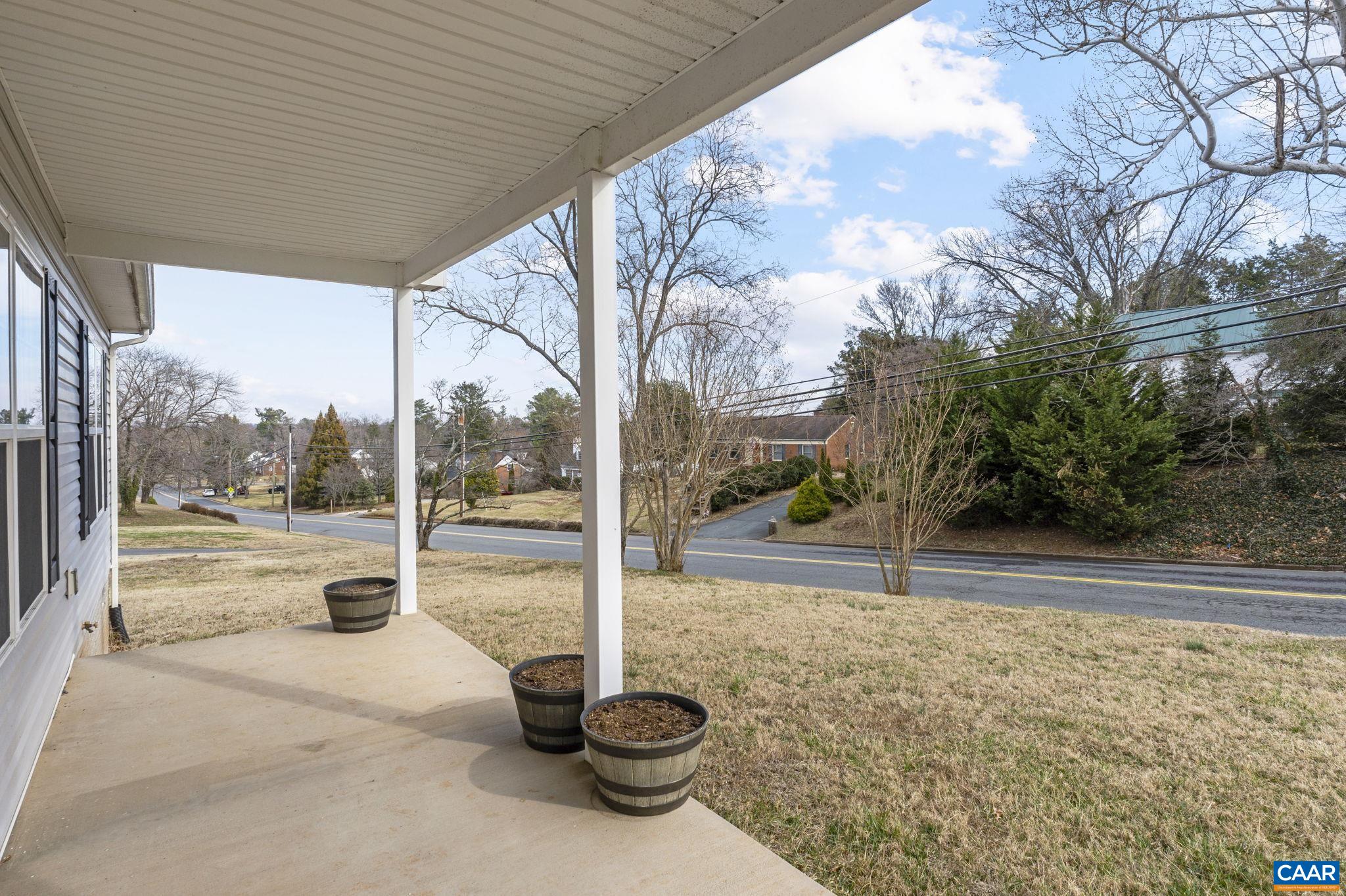 133 Red Hill Road Orange, VA 22960 - Photo 10 of 38 a view of a swimming pool with a porch