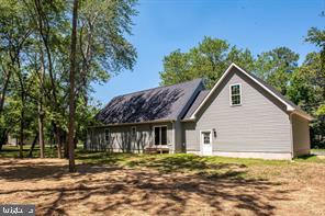 6980 Hopkins Neck Road Easton, MD 21601 - Photo 4 of 20 Charming home nestled among trees.