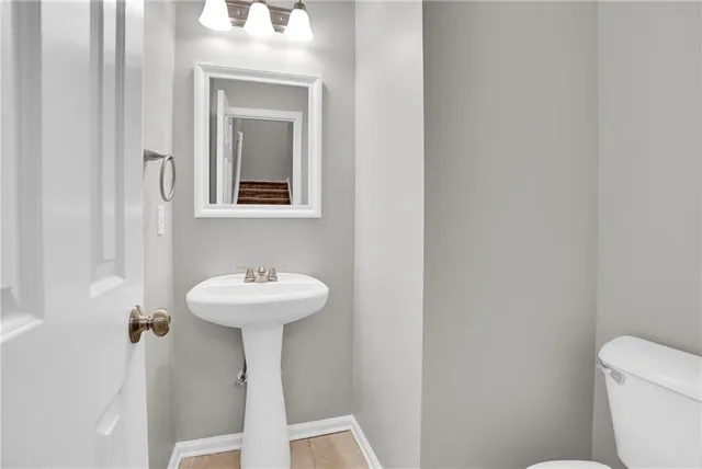 a bathroom with a sink and a toilet