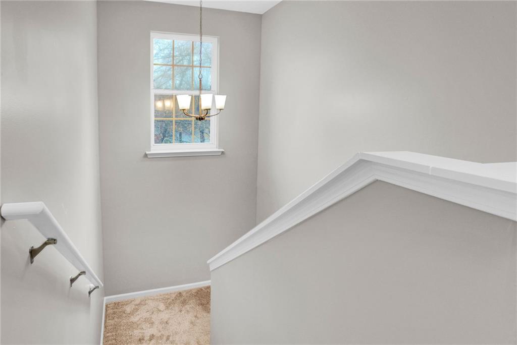 241 Village Square Drive Woodstock, GA 30188 - Photo 19 of 40 a view of an empty room with a window