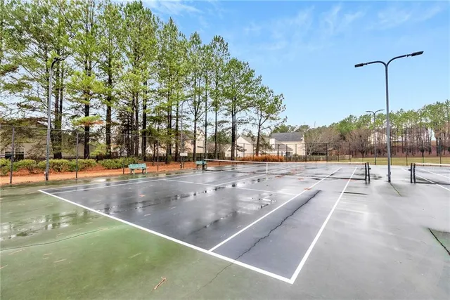 a view of a swimming pool with a patio