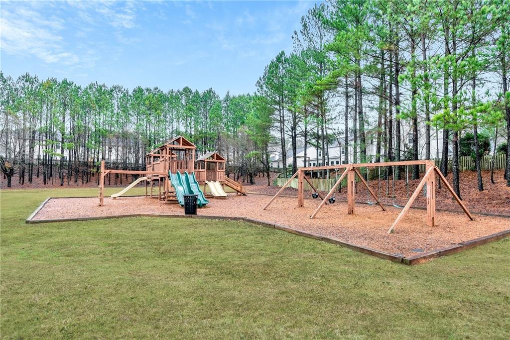 241 Village Square Drive Woodstock, GA 30188 - Photo 35 of 40 a view of a park with slide
