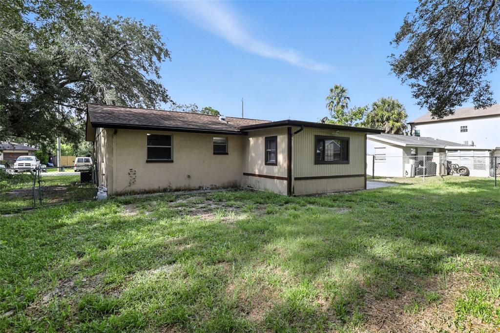 8035 Gulf Way Hudson, FL 34667 - Photo 24 of 26 a view of a house with a yard