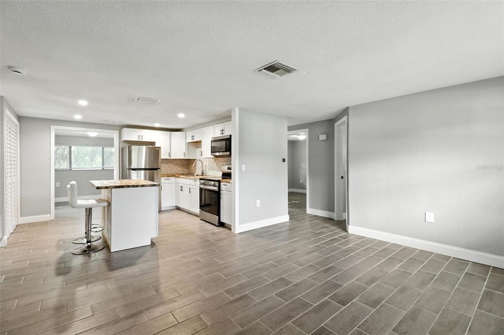 8035 Gulf Way Hudson, FL 34667 - Photo 5 of 26 a view of kitchen with wooden floor