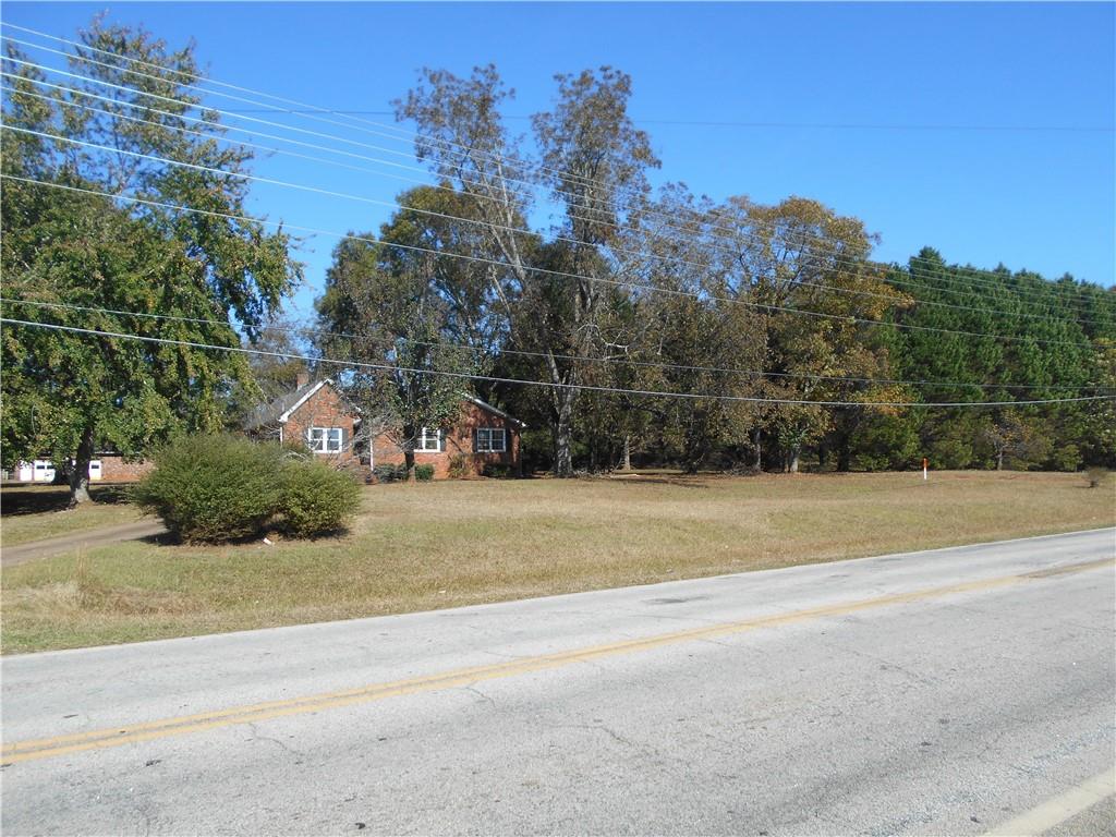 1230 Good Hope Road Monroe, GA 30655 - Photo 16 of 76 a view of a yard in front of a house