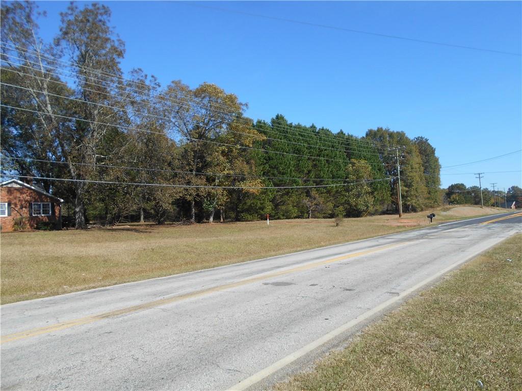 1230 Good Hope Road Monroe, GA 30655 - Photo 18 of 76 a view of a road with a building in the background