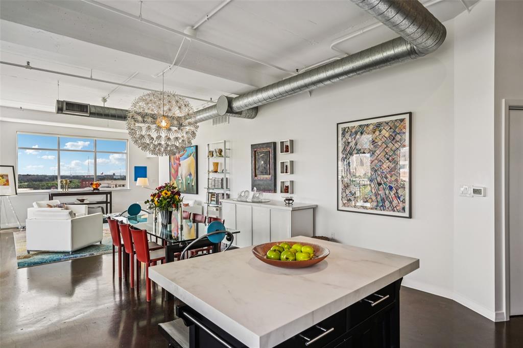 1001 Belleview Street, Unit 708 Dallas, TX 75215 - Photo 11 of 40 a view of a dining room with furniture