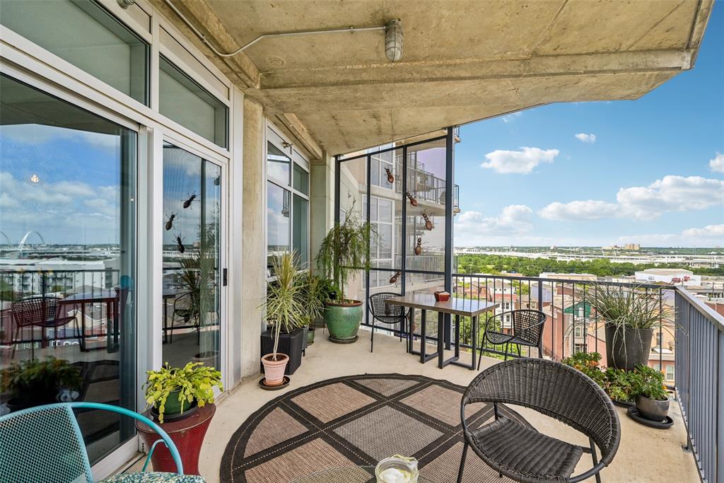 1001 Belleview Street, Unit 708 Dallas, TX 75215 - Photo 29 of 40 a view of a balcony with chairs