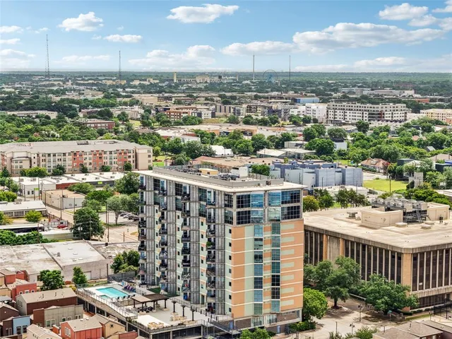 a view of a city with tall buildings