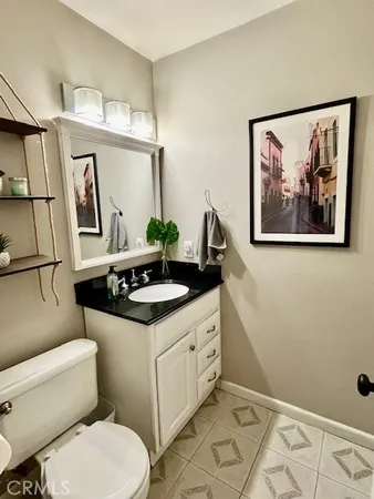 a bedroom with bed and window