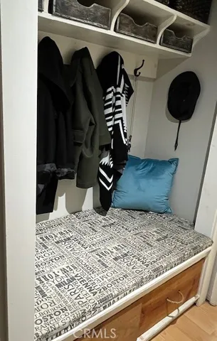 a bathroom with a sink mirror vanity and toilet