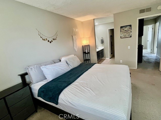 25729 Tournament Road Valencia, CA 91355 - Photo 16 of 29 a bedroom with bed and window