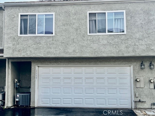 25729 Tournament Road Valencia, CA 91355 - Photo 29 of 31 a front view of a house