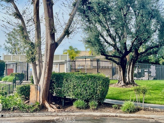 25729 Tournament Road Valencia, CA 91355 - Photo 30 of 31 a front view of a house with garden