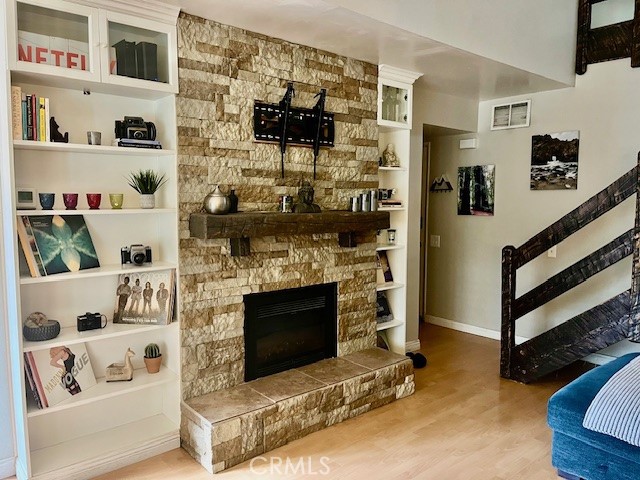 25729 Tournament Road Valencia, CA 91355 - Photo 10 of 29 FIREPLACE WITHIN BUILT-IN SHELVES