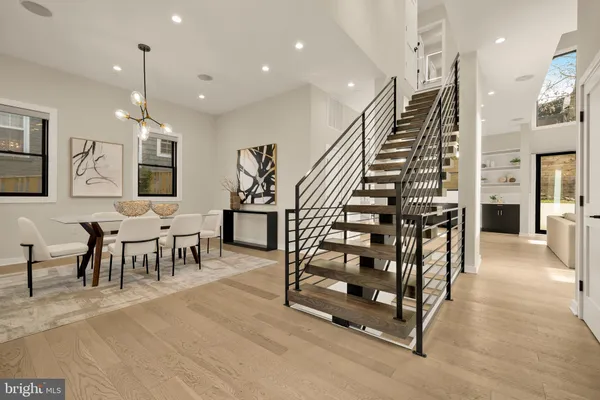a view of a room with lots of furniture and lots of furniture