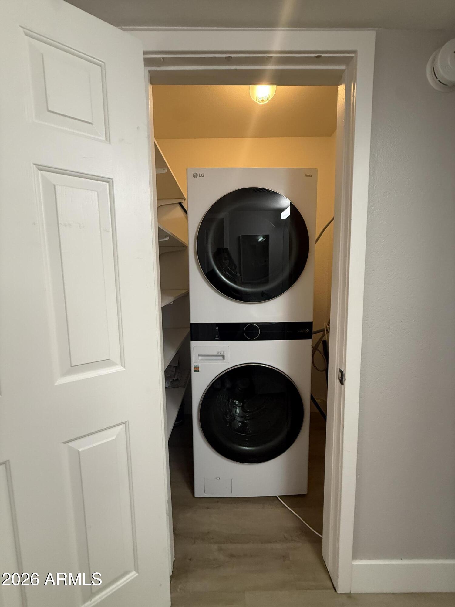 4540 North 44th Street, Unit 50 Phoenix, AZ 85018 - Photo 15 of 31 a utility room with dryer and washer