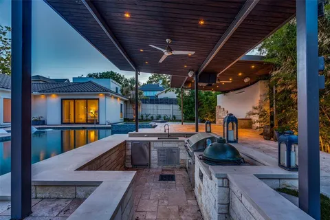 a view of swimming pool with seating space