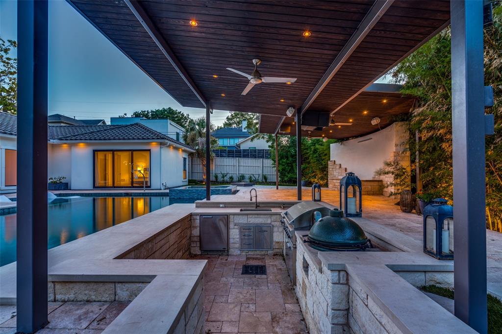 8647 Wingate Drive Dallas, TX 75209 - Photo 26 of 27 a view of swimming pool with seating space