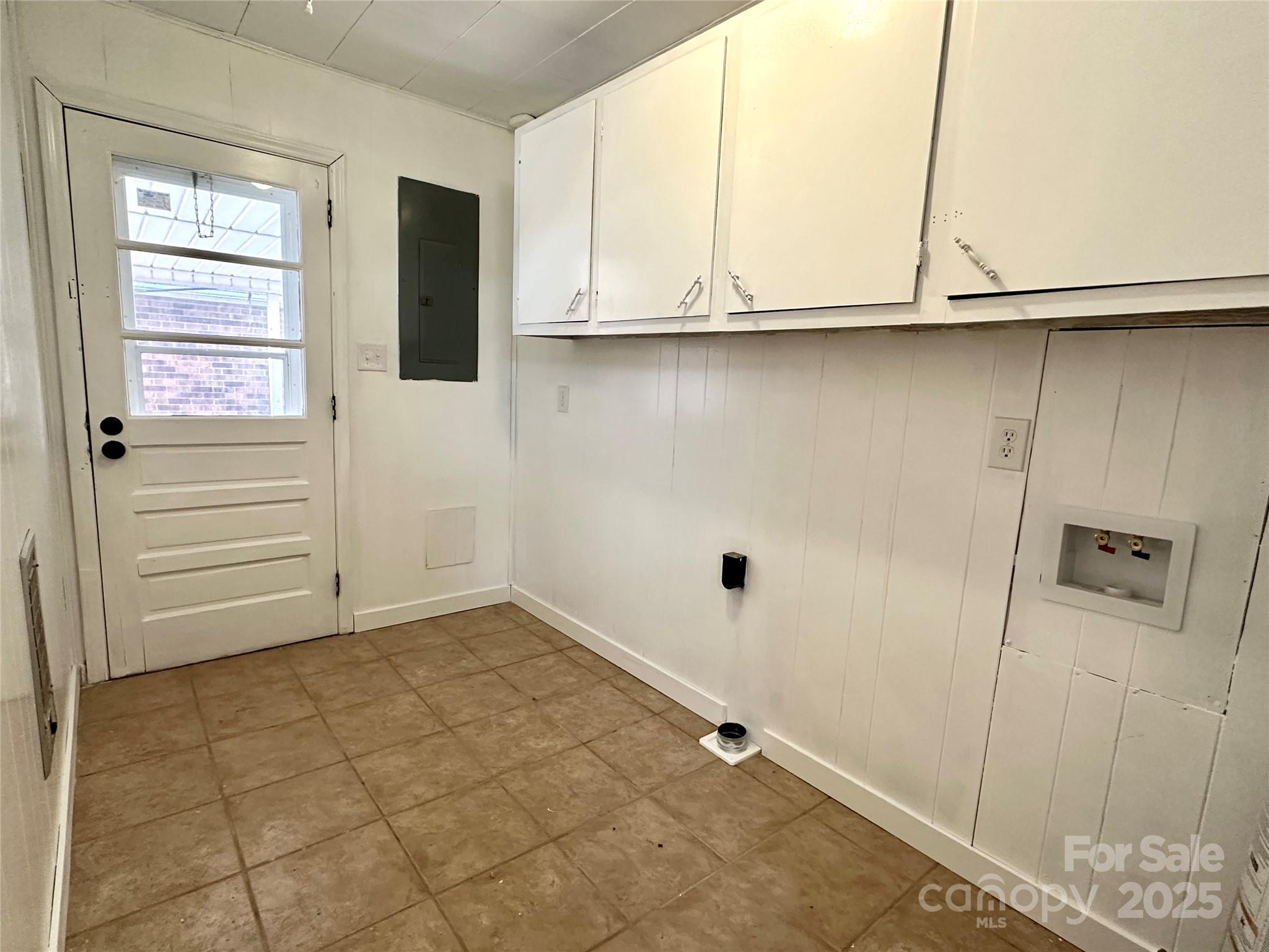 208 Murdock Road Bakersville, NC 28705 - Photo 20 of 32 a view of an empty room with windows