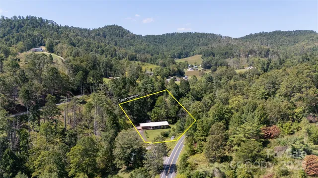a view of a wooden door with a bench