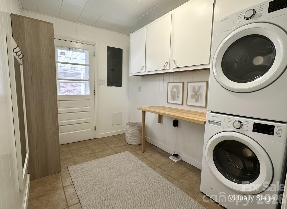 208 Murdock Road Bakersville, NC 28705 - Photo 30 of 46 a view of a storage & utility room with washer and dryer