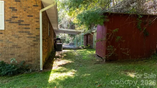 a view of a yard with an trees
