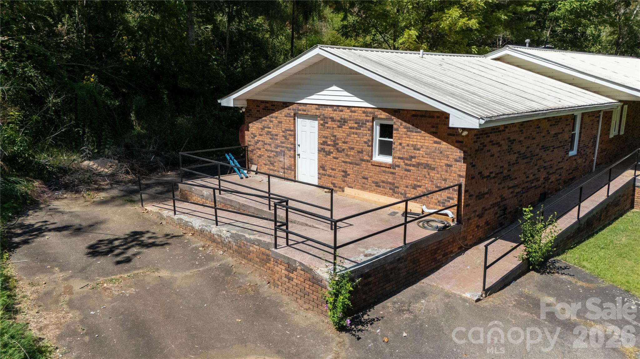 208 Murdock Road Bakersville, NC 28705 - Photo 38 of 46 a roof view