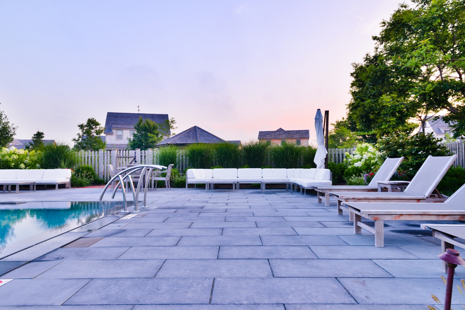 3 Wood Lily Road Nantucket, MA 02554 - Photo 47 of 55 a view of a patio with a table and chairs