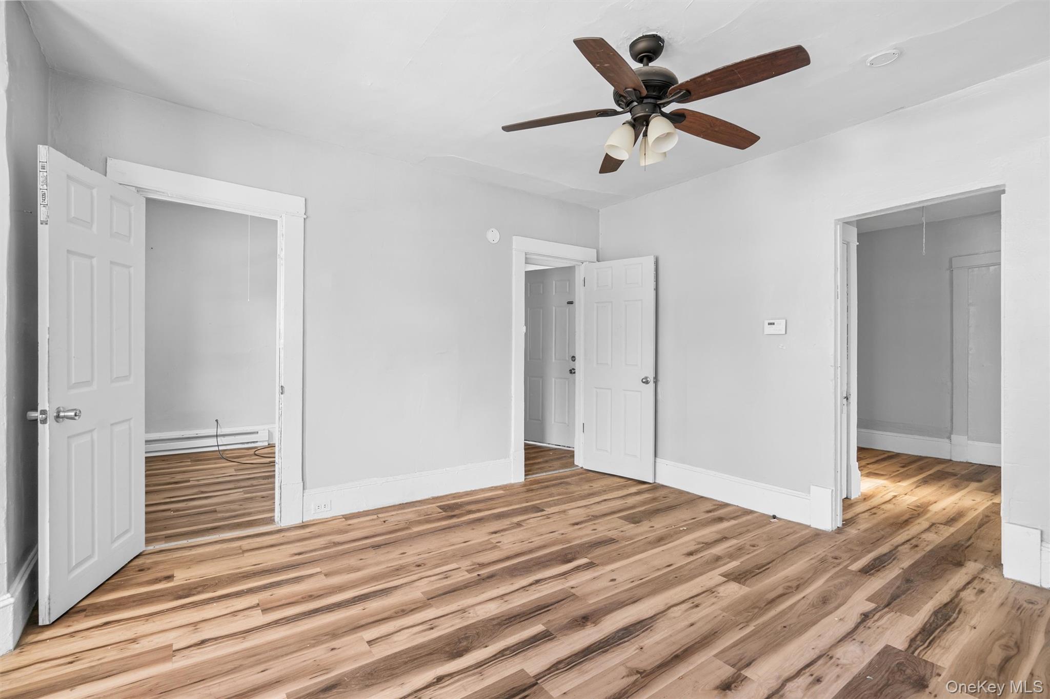 72 Wisner Avenue Newburgh, NY 12550 - Photo 10 of 19 a view of empty room with wooden floor