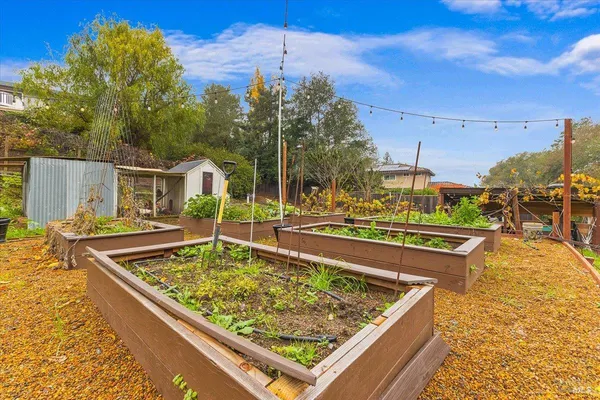 a view of a swimming pool with a patio
