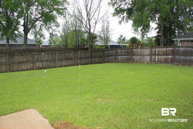 336 Collinwood Loop Foley, AL 36535 - Photo 19 of 22 Fenced Backyard