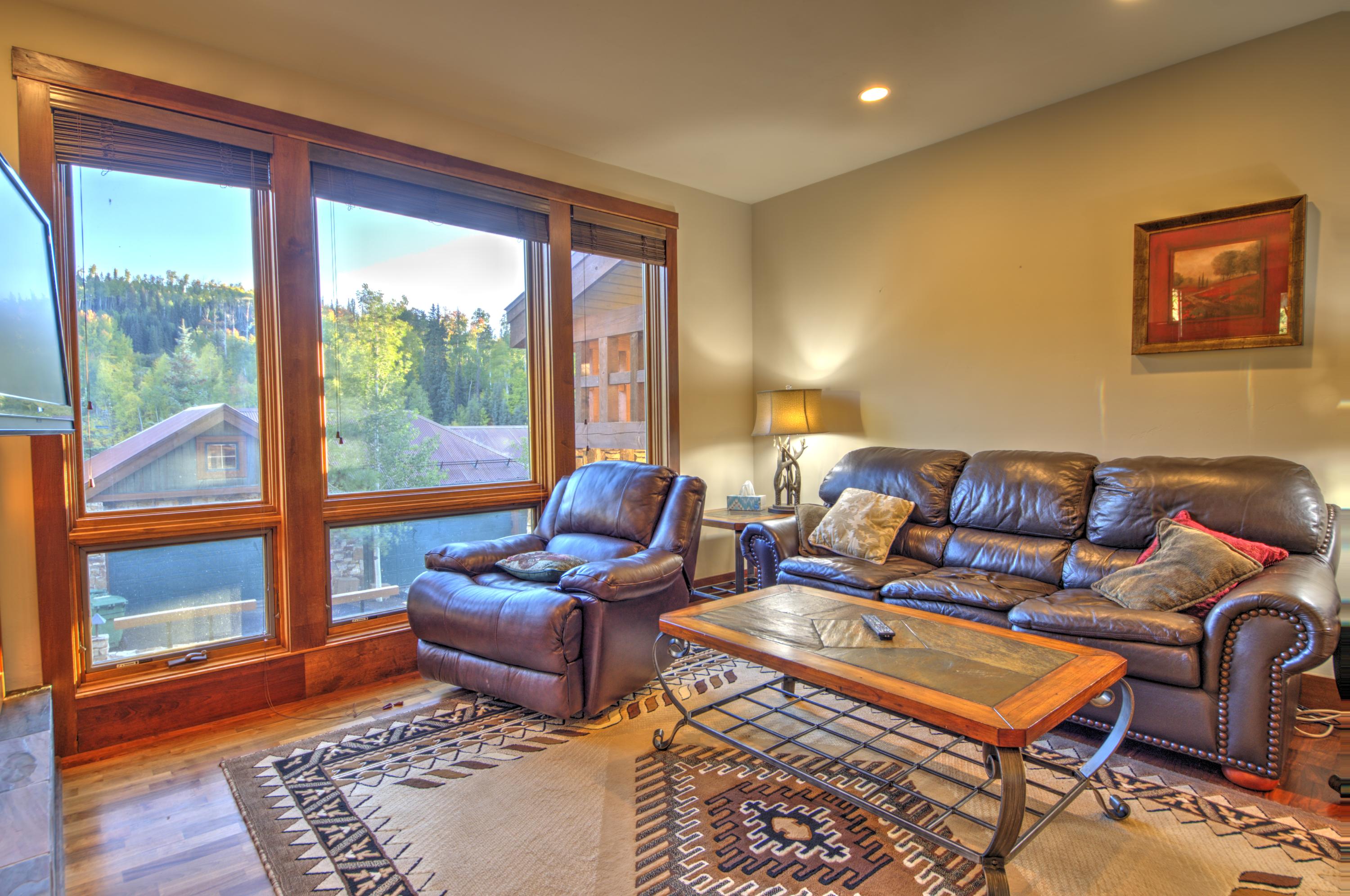 333 Adams Ranch Road, Unit 201 Mountain Village, CO 81435 - Photo 2 of 18 Lovely living area with comfortable furnishings