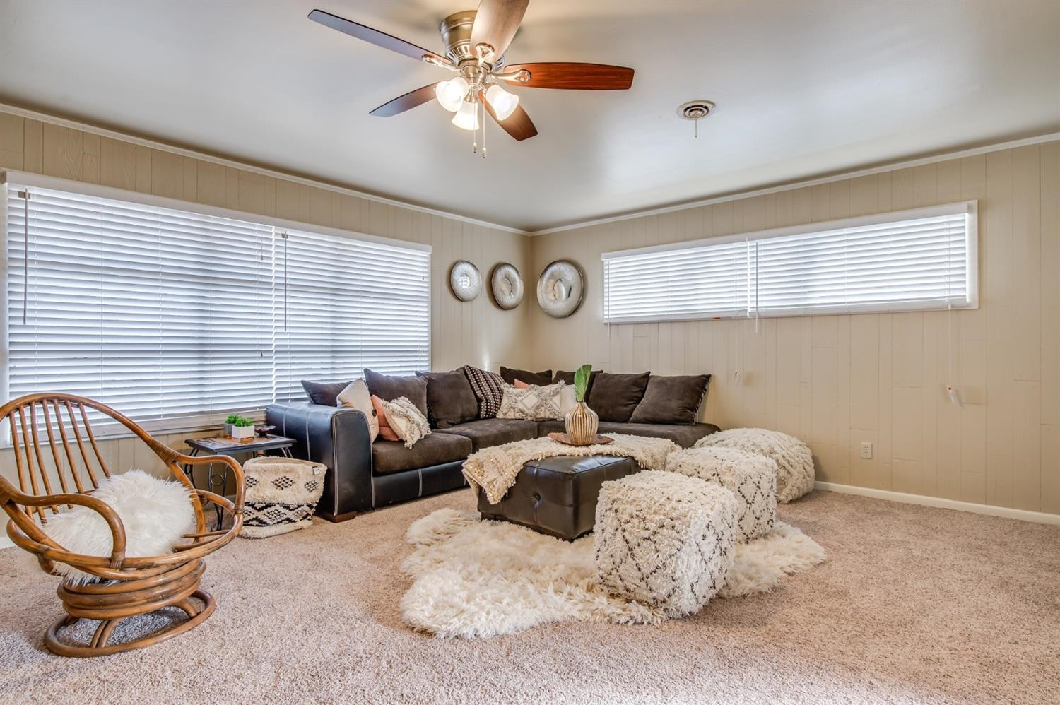 4319 40th Street Lubbock, TX 79413 - Photo 5 of 10 a bed room with a bed and a chandelier