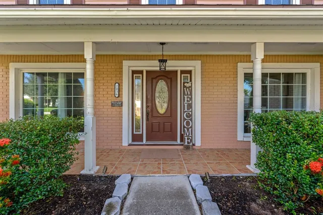 a front view of a house with a porch
