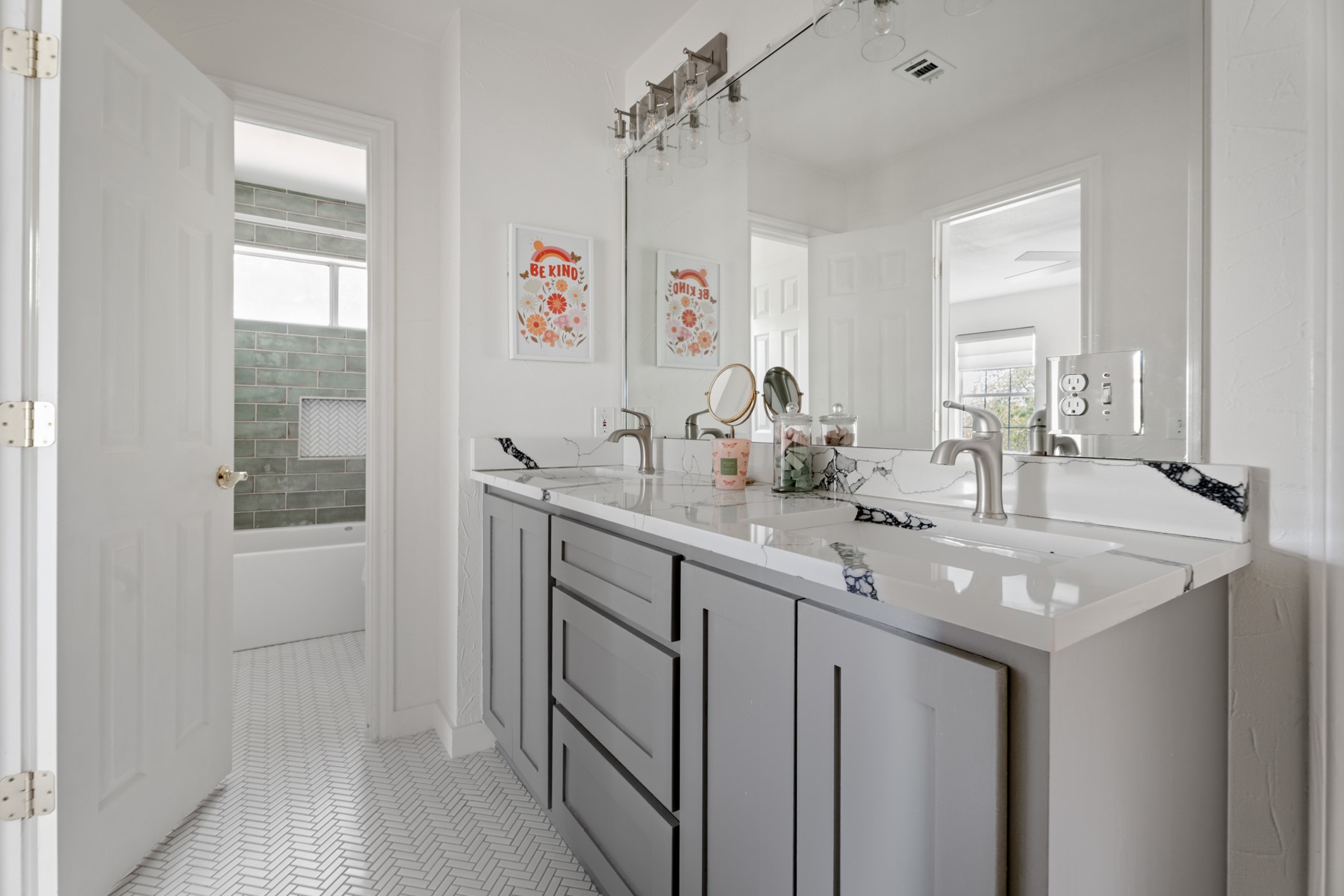 102 Hurst Creek Road Lakeway, TX 78734 - Photo 23 of 29 a bathroom with a granite countertop sink and a mirror