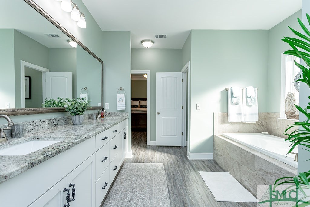 202 Lennox Place Rincon, GA 31326 - Photo 26 of 47 Comfort height cabinetry with double vanities.