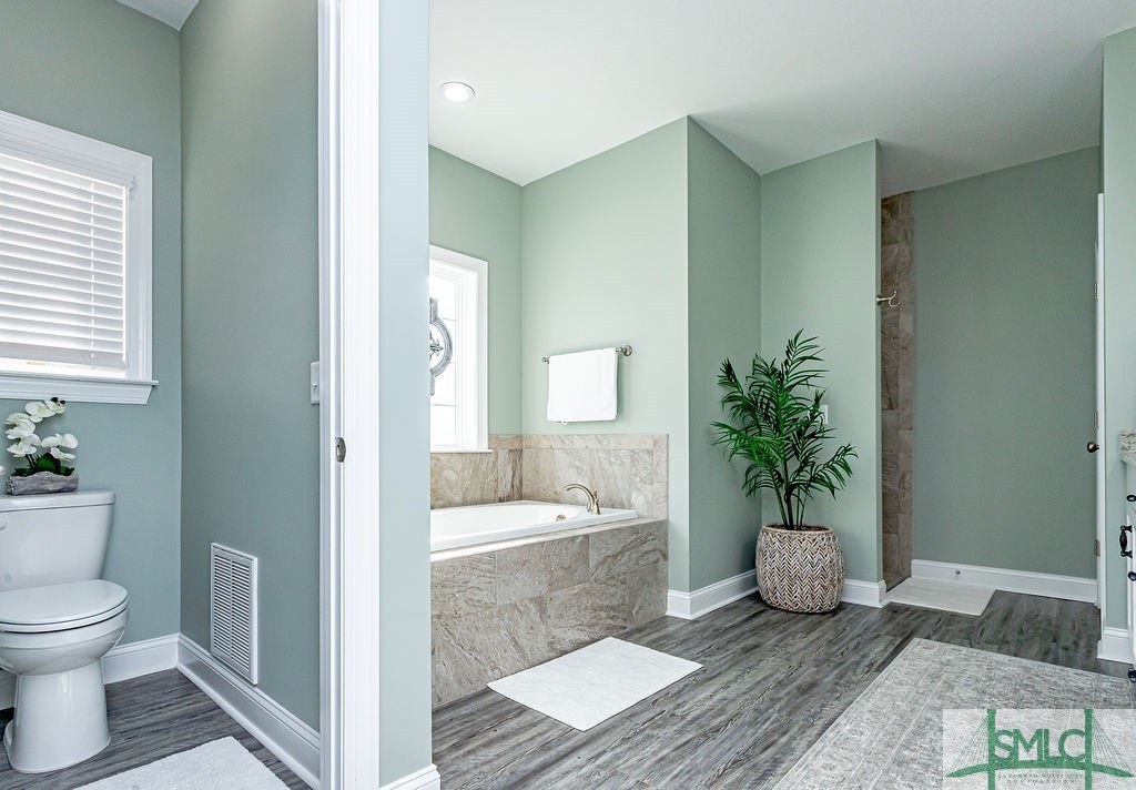 202 Lennox Place Rincon, GA 31326 - Photo 27 of 47 Luxurious ensuite with separate water closet.