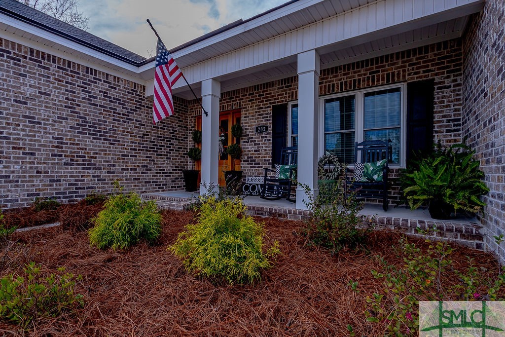202 Lennox Place Rincon, GA 31326 - Photo 4 of 47 Welcoming front porch, perfect for people watching