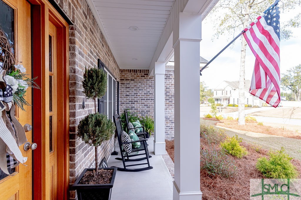 202 Lennox Place Rincon, GA 31326 - Photo 5 of 47 Rockers waiting on you and your morning coffee!
