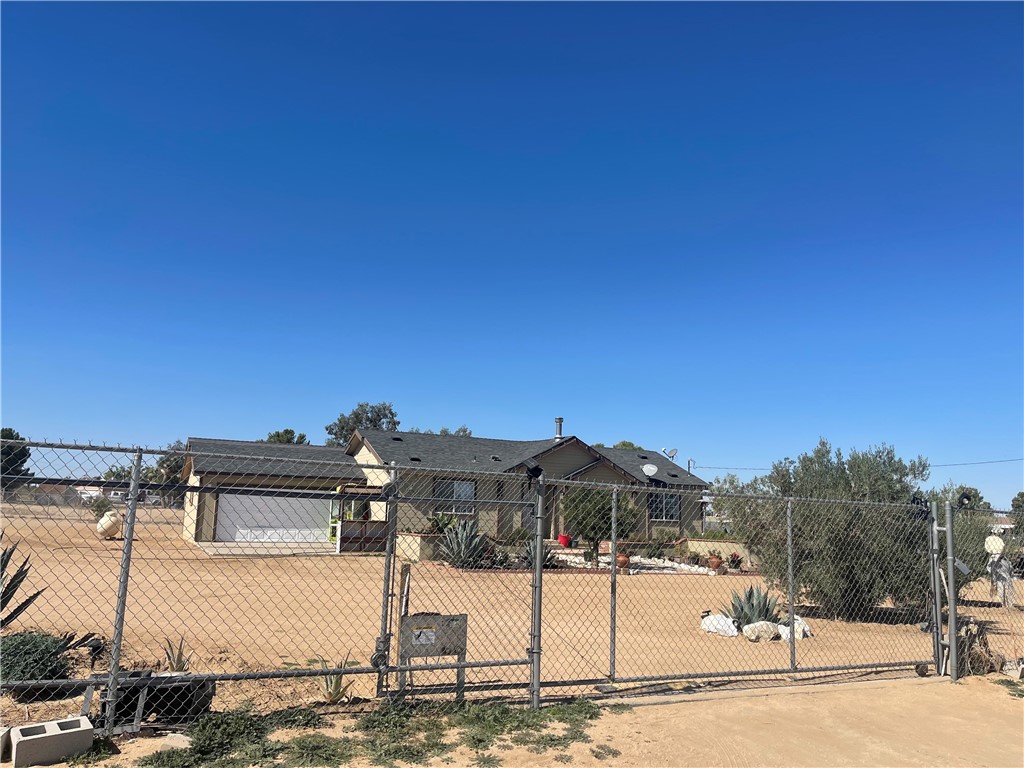 13426 Manada Road Phelan, CA 92371 - Photo 1 of 1 a view of a terrace with chairs