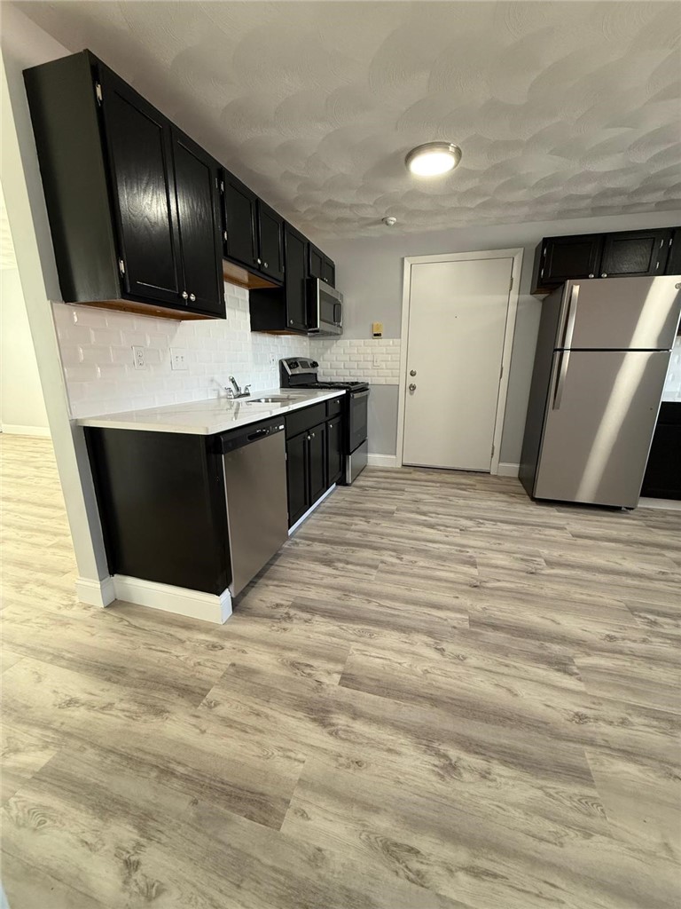 61 Esten Avenue, Unit 4 Pawtucket, RI 02860 - Photo 2 of 16