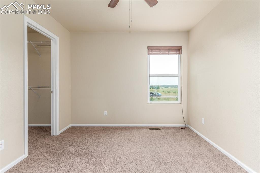 7750 Dutch Loop Colorado Springs, CO 80925 - Photo 30 of 50 a view of room with window