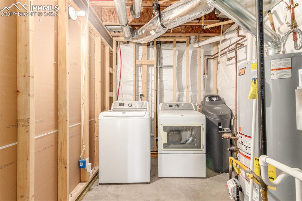 7750 Dutch Loop Colorado Springs, CO 80925 - Photo 40 of 50 a utility room with dryer and washer